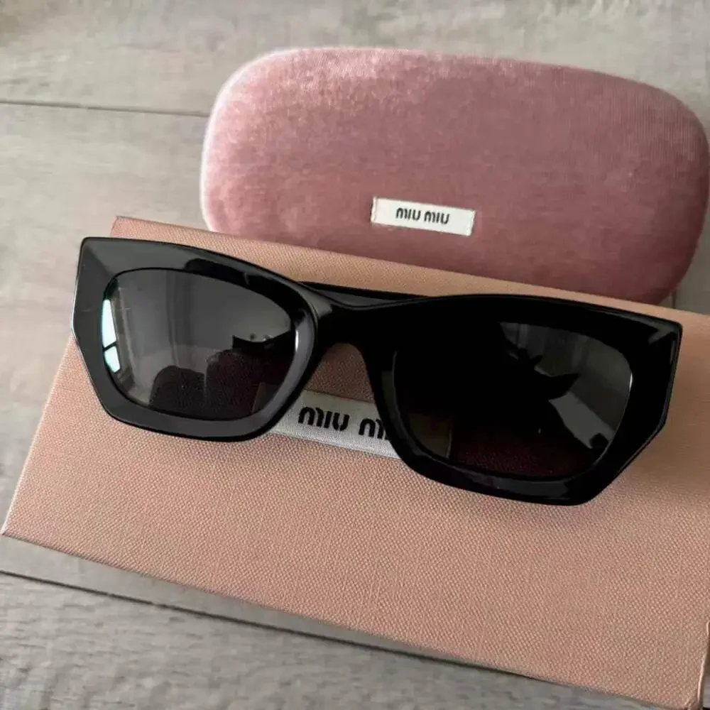 Miu Miu Glossy Black Cat Eye Acetate Sunglasses